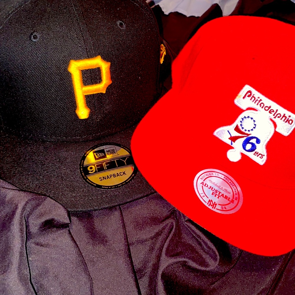 Two snapback fitted hats